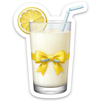 Glass of milk with a yellow bow wrapped around the glass and lemon sticker