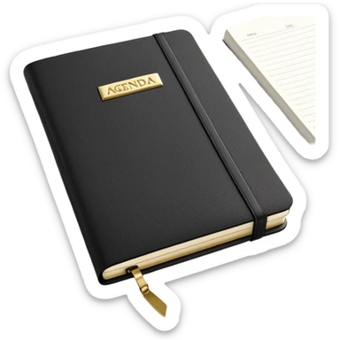 A closed black Moleskine notebook with 'AGENDA' embossed on the cover, professional meeting planner sticker