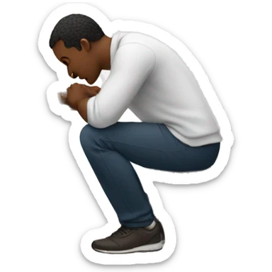 man kneeling in front of computer sticker