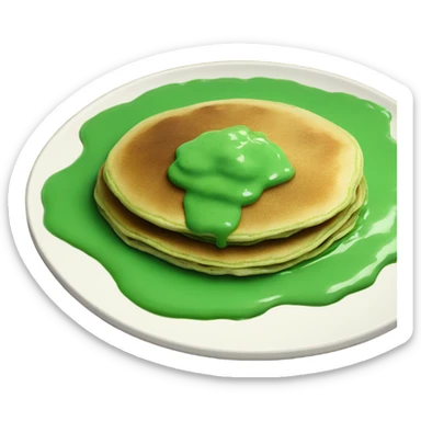 green pancakes on a plate with green sauce sticker