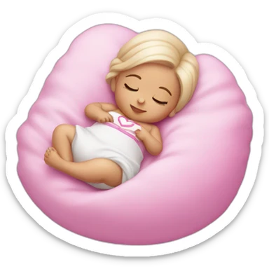 white sleeping newborn in a dress with a barbie logo sticker
