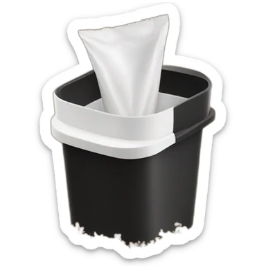 Black cubic plastic container with wood shavings inside, and a white tube that irrigates the top sticker