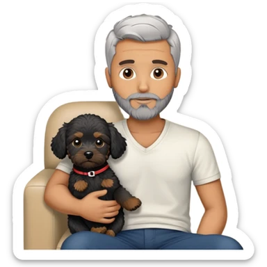 34 year old man with short straight grey hair and beard with A black cavapoo puppy with a white chest on the sofa sticker