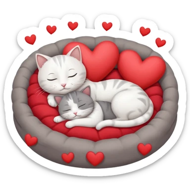 White cat and gray cat sleeping in a bed full of hearts sticker