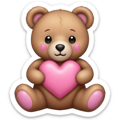 Teddy bear with a pink heart sticker