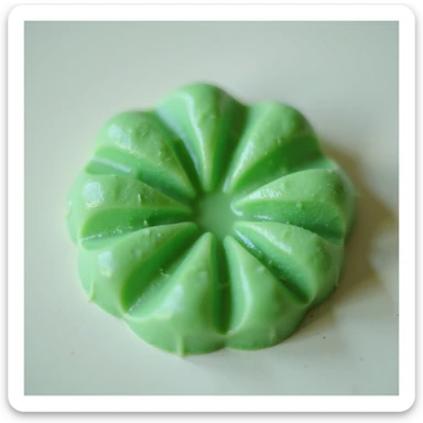realistic green candy shaped like a flower, photorealistic style sticker