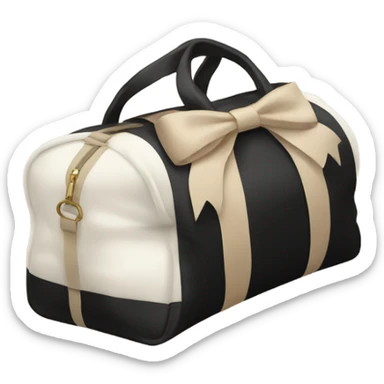 white and black duffle bag with a beige bow sticker