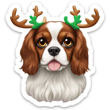 A tri colour cavalier King Charles spaniel wearing reindeer ears sticker