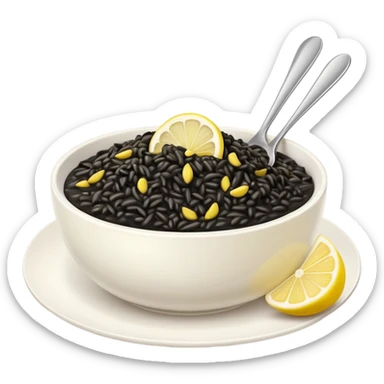 black risotto in a white bowl with a slice of lemon sticker