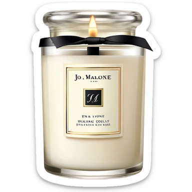 Elegant Jo Malone luxury candle in a clear glass jar with a simple label and a burning flame sticker