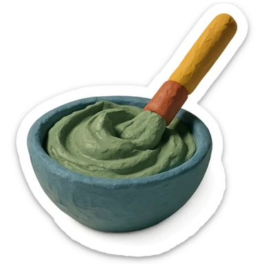 a bowl of clay mask with a brush, claymation style sticker