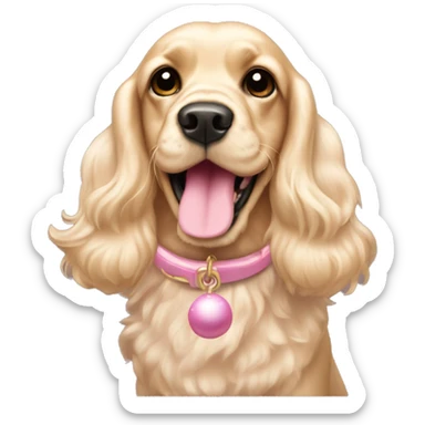 Blond cocker spaniel wearing two light pink sleighbell sticker