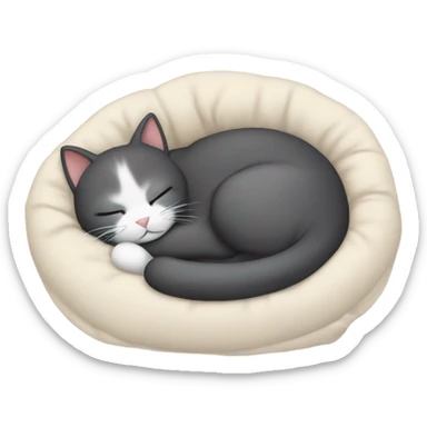 cat sleeping in a bed sticker