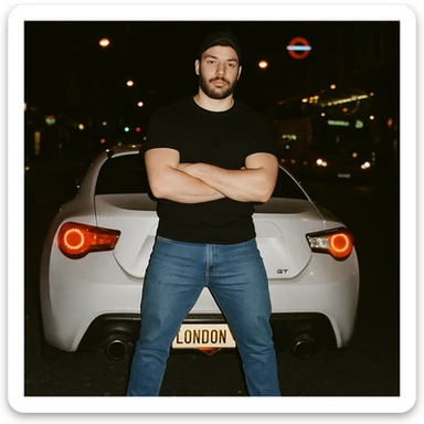 Grunge-style analog photo, London 2025, person inspired by the new reference image in model pose in front of a Nissan GT 86, black t-shirt, jeans, Nike Air Jordan low, using flash, analog grain, city night, 1/8. sticker