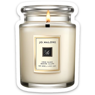 Elegant Jo Malone luxury candle in a clear glass jar with a simple label and a burning flame sticker