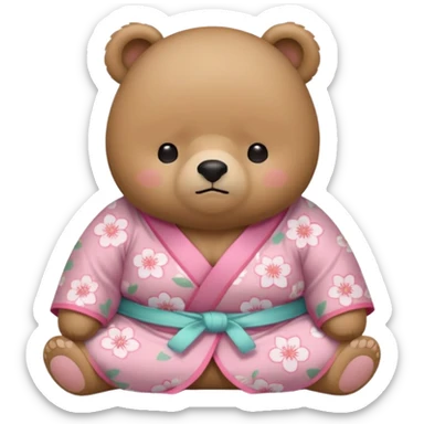 A cute chubby light-brown bear wearing a pastel pink sakura-patterned kimono, tiny body and round head, adorable simple face, sleepy half-closed eyes, small blush on cheeks, sitting while dozing off, tiny “zzz” floating above the head sticker