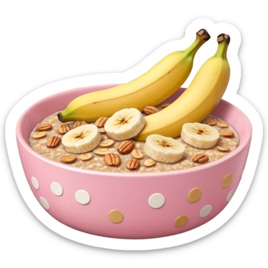 banana baked oats in a bowl like oat meal with a couple banana slices on top that look a little bit caramelised and a light pink bowl with white polka dots sticker