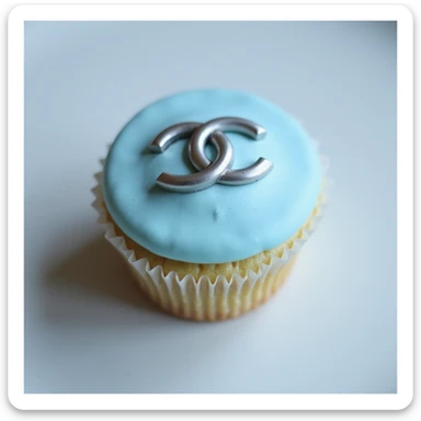 photorealistic pastel blue Chanel cupcake with a silver logo, no background sticker