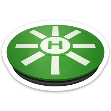 a helipad with a green surface and an H in the center sticker