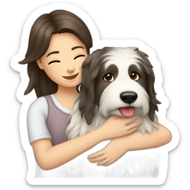 A brunette girl is hugging a Polish Tatra Sheepdog. sticker