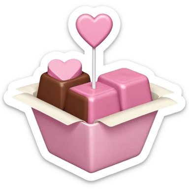 Two square milk chocolate , Each praline is a sharp-edged cube with smooth glossy chocolate coating, placed in a small white fluted paper candy cup. On top of each cube is a flat pastel pink heart-shaped icing sticker