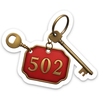 antique brass hotel key with large red leather room number tag sticker