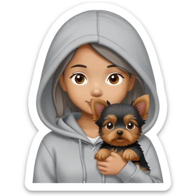 a brown asian girl wearing a grey hoodie with a yorkie puppy sticker