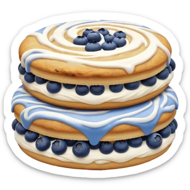 2 blueberry biscuits side-by-side with white icing swirls on top sticker