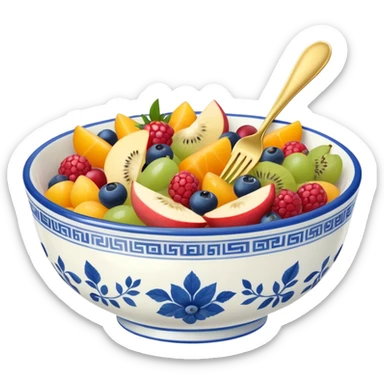 Blue and white China dish with fruit salad in it and a gold fork sticker