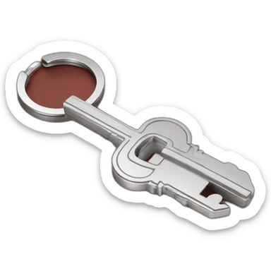 Old silver key attached to red float key ring sticker