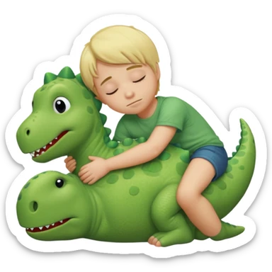 Blond boy sleeping with green pillow with dinosaur sticker