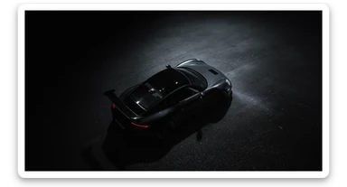 Editorial shot of a porsche 911 gt3 rs, top dutch angle, black voide around, top spotlight, captured on arri alexa sticker