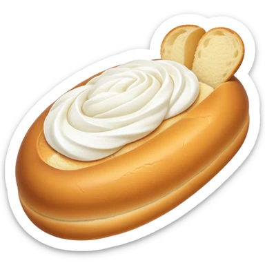 An oval-shaped, golden bun with a sugar-dusted top, filled with a smooth white cream. The bread looks soft and fluffy. sticker