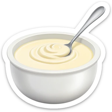bowl of creamy garlic aioli sauce with a spoon sticker
