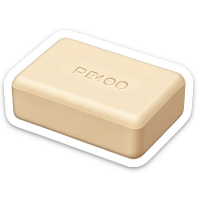 rectangular pale beige soap bar with slightly rounded edges, matte chalky surface, dense and firm, subtle top ridges or embossed mark, no packaging, no bubbles, no cloth, soft lighting, subtle shadows, emoji scale sticker