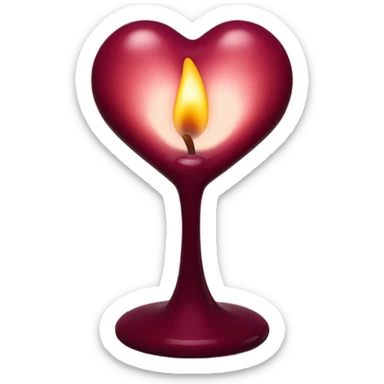 A heart-shaped candle in a burgundy glass holder casting a warm glow
 sticker