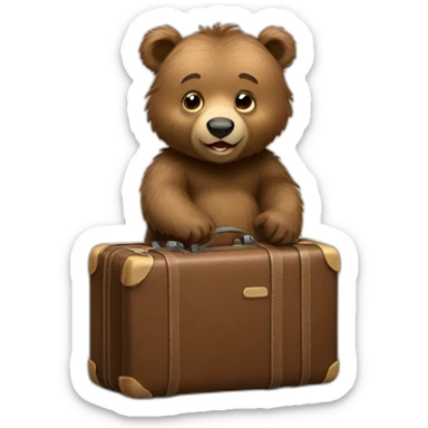 Baby Grizzly bear with a suitcase sticker