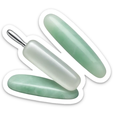 one silver gua sha and one silver jade roller used for beauty sticker