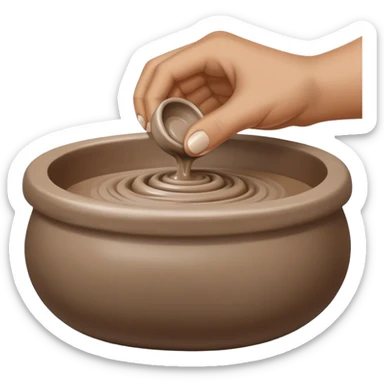 single hand scooping on the side of a blob of clay on a silver pottery wheel sticker