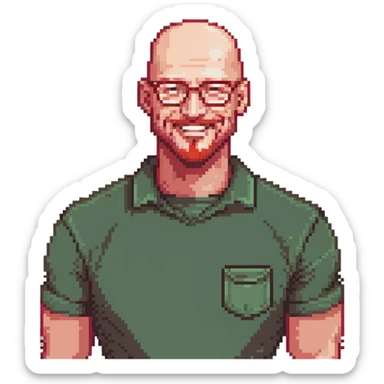 muscular bald man with red goatee and glasses, smiling, wearing a green shirt sticker