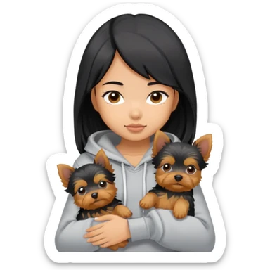 a black-haired asian girl in a gey hoodie with a yorkie puppy sticker