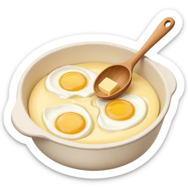A carton of eggs, butter and a cream ceramic baking bowl with a wooden spoon in it sticker