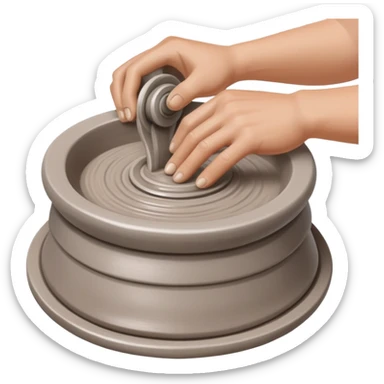 hands pressing clay sidewalls down onto a silver pottery wheel with fingers and thumbs to attach it sticker