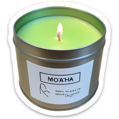 realistic lit matcha scented candle in a silver tin with a small white label that says ‘matcha’ sticker