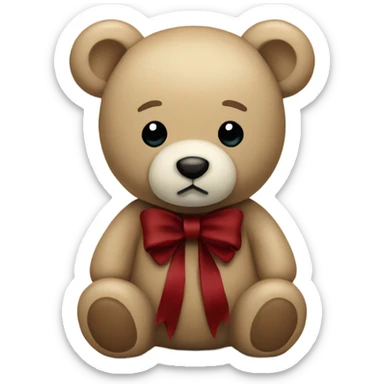 Beige teddy bear with a dark red bow sticker