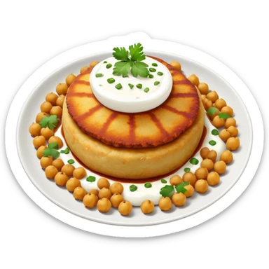Aloo Tikki Chaat on a small plate with chickpeas, potato patty with yogurt and chutney sticker