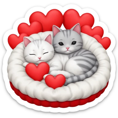 White cat and gray cat sleeping together in a bed full of hearts sticker