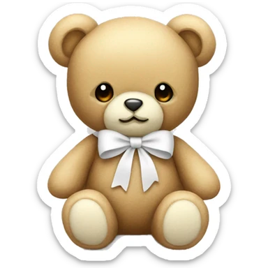 Beige teddy with a white bow sticker