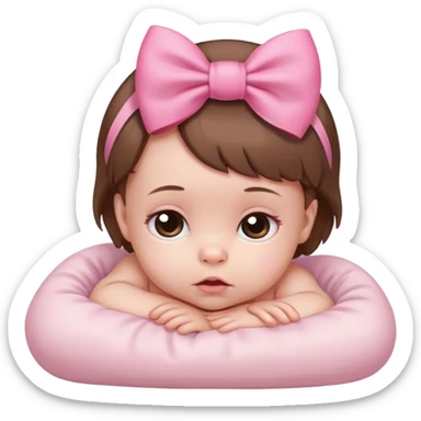 White newborn baby with brown hair and pink bow sticker