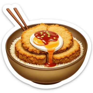 katsudon in a bowl: bowl filled with rice, a bit of sauce over the rice and a breaded pork cutlet sticker